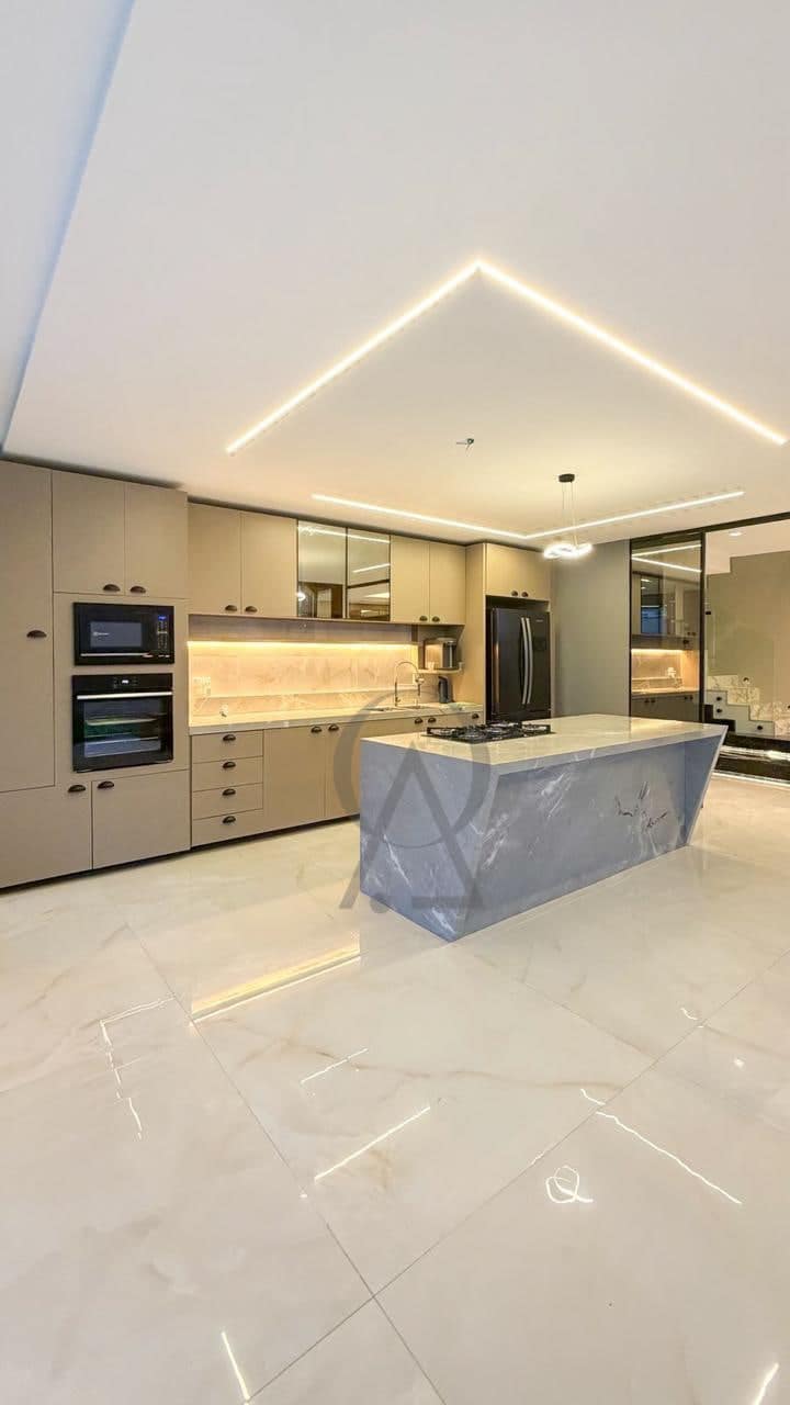 Cozinha planejada com ilha central