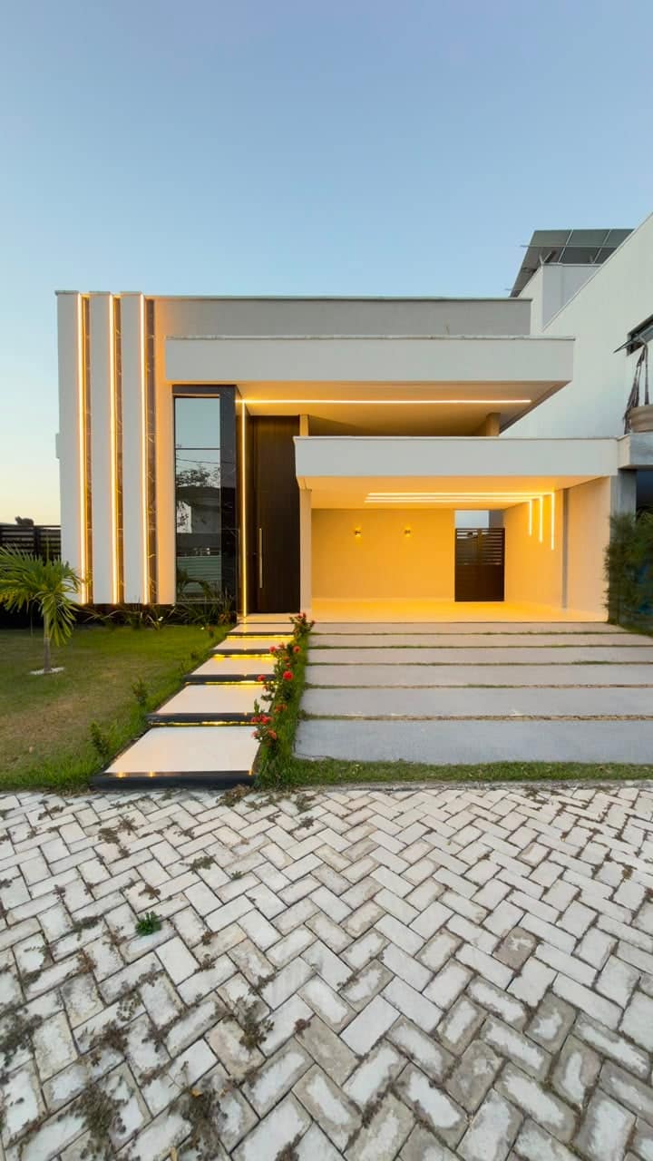 Fachada da casa no Terras 4 Cidade Alpha
